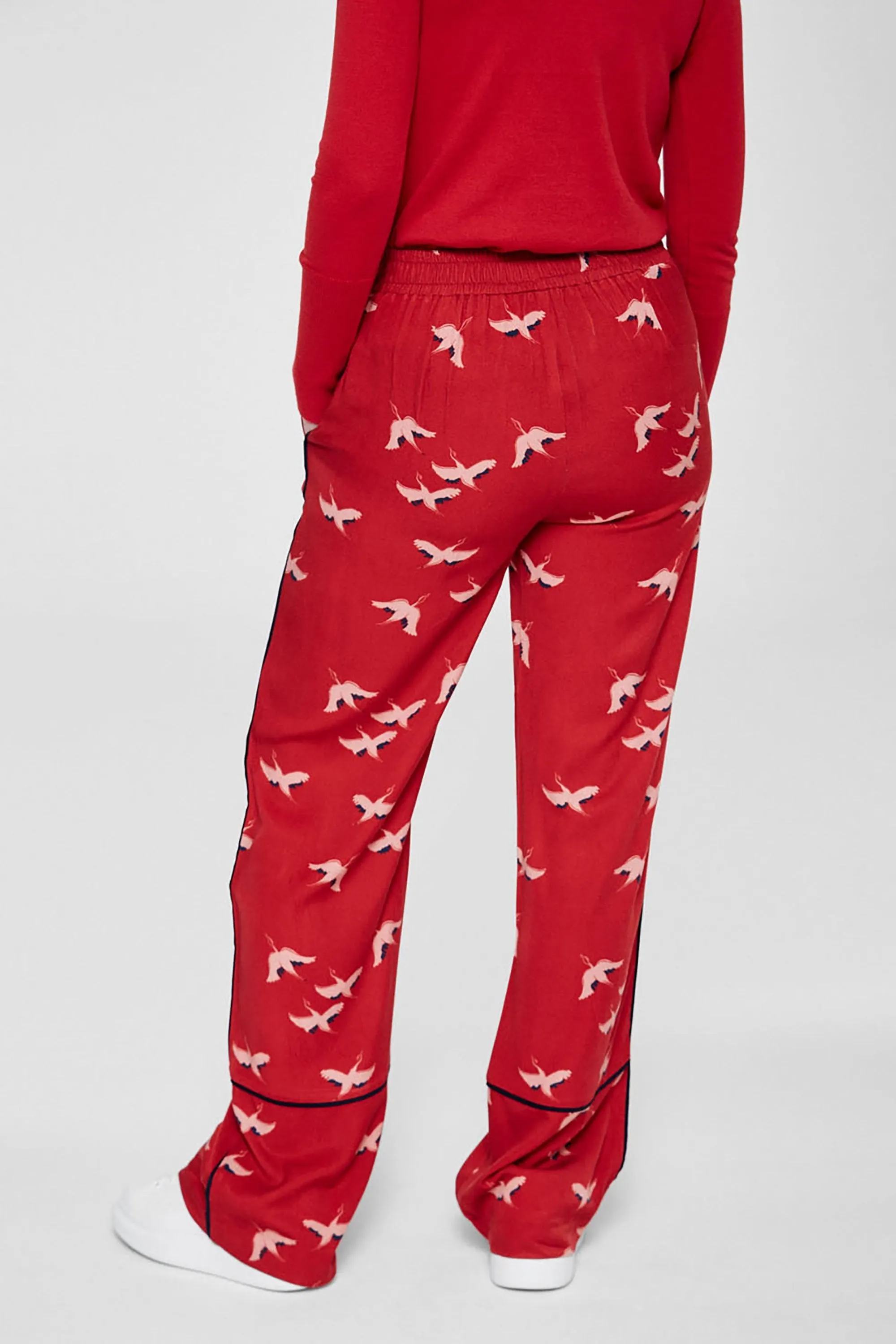 bendi pants <br> red & cranes in the sky <br> by ARMEDANGELS