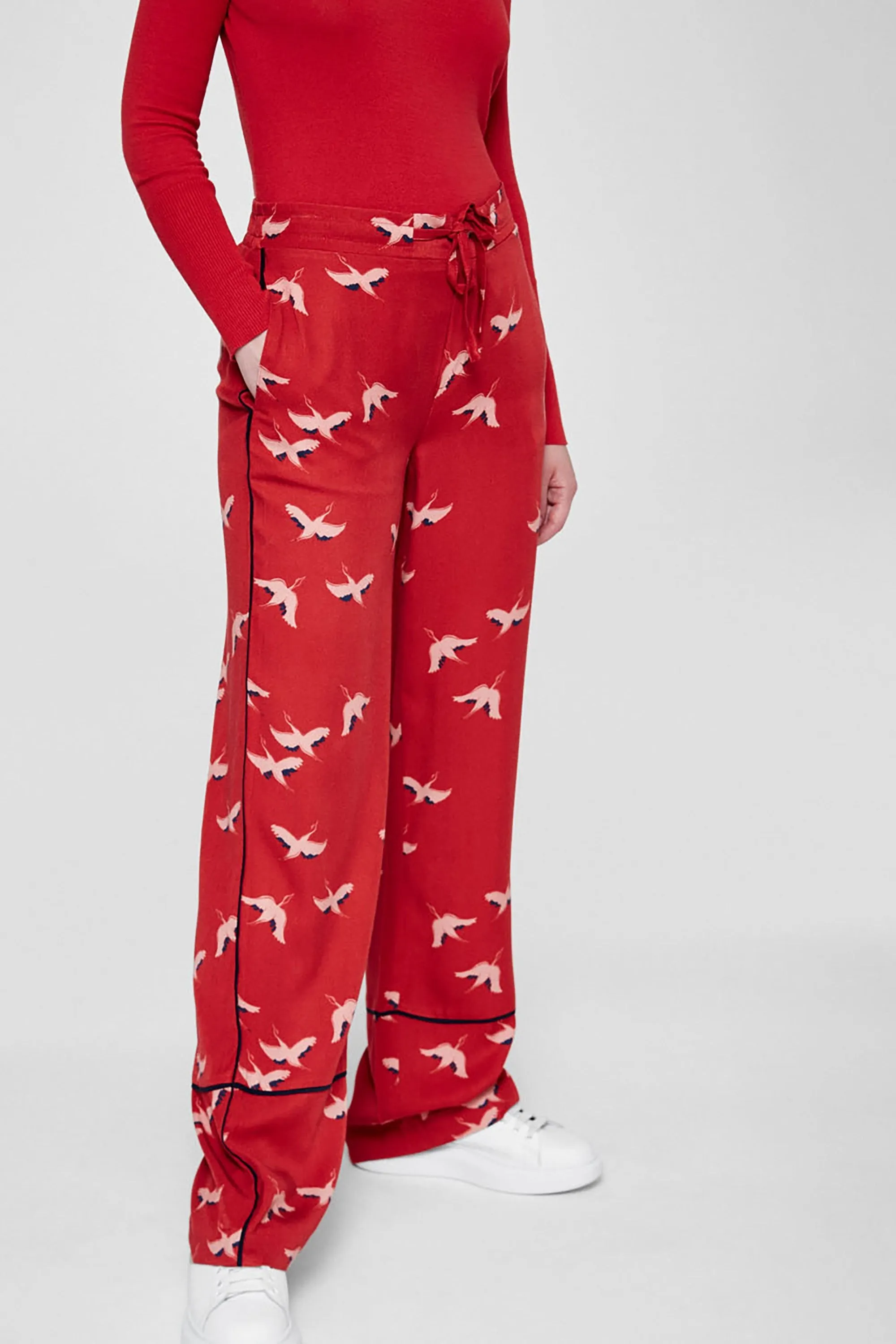 bendi pants <br> red & cranes in the sky <br> by ARMEDANGELS