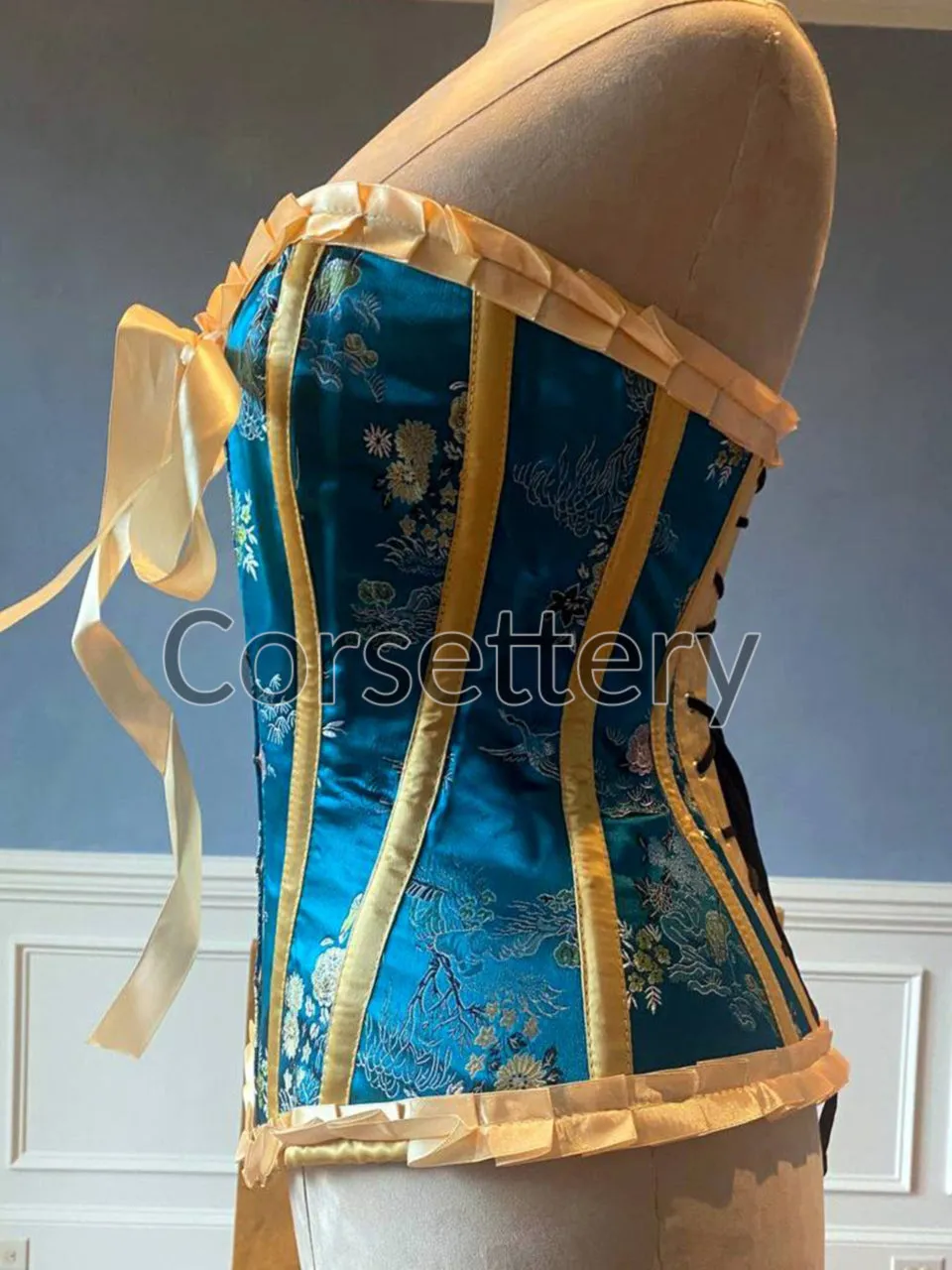 Bright blue brocade steampunk corset with ribbons and bow. Steel-boned corset for tightlacing. Prom, gothic, steampunk Victorian corset.