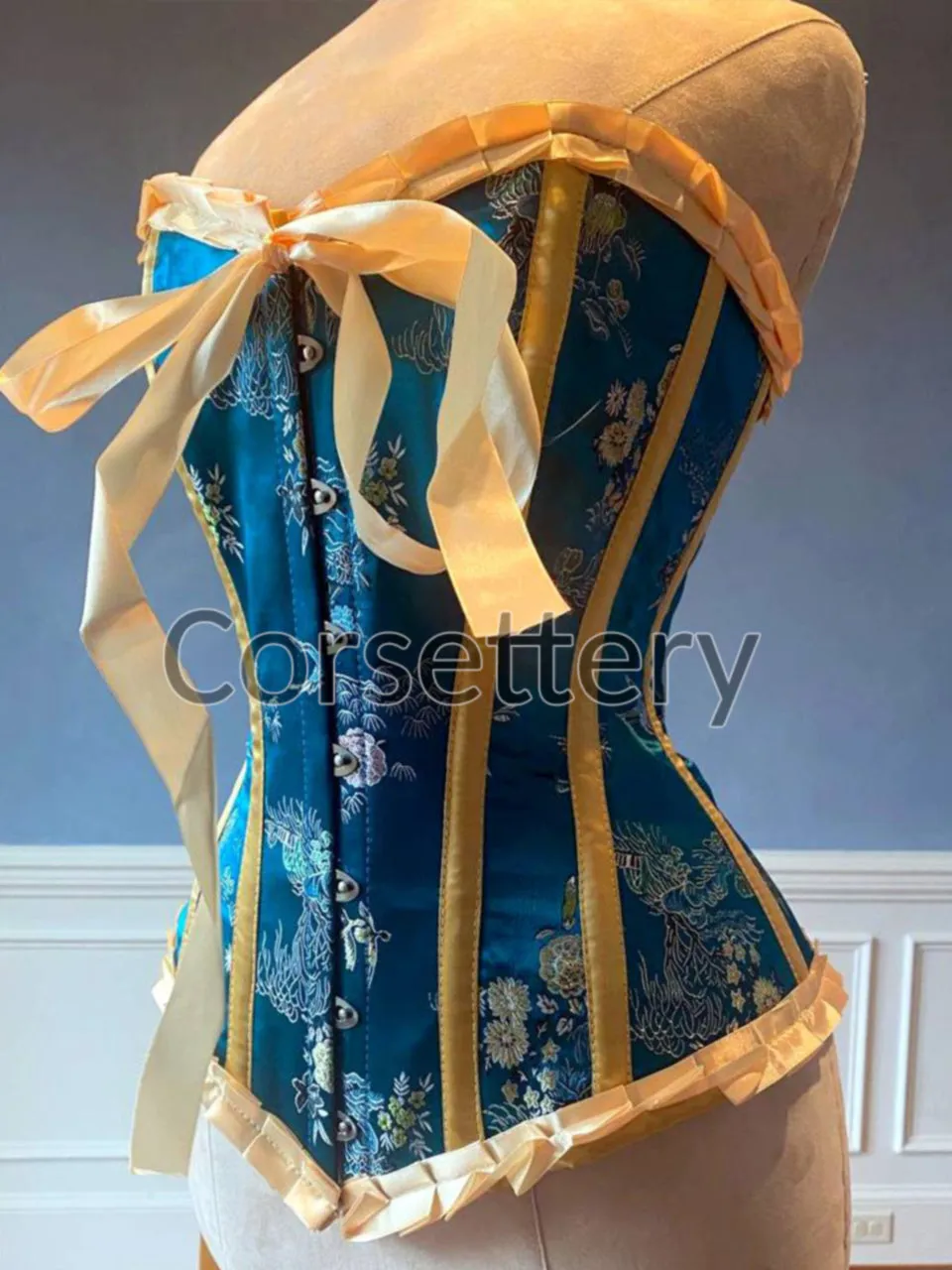 Bright blue brocade steampunk corset with ribbons and bow. Steel-boned corset for tightlacing. Prom, gothic, steampunk Victorian corset.