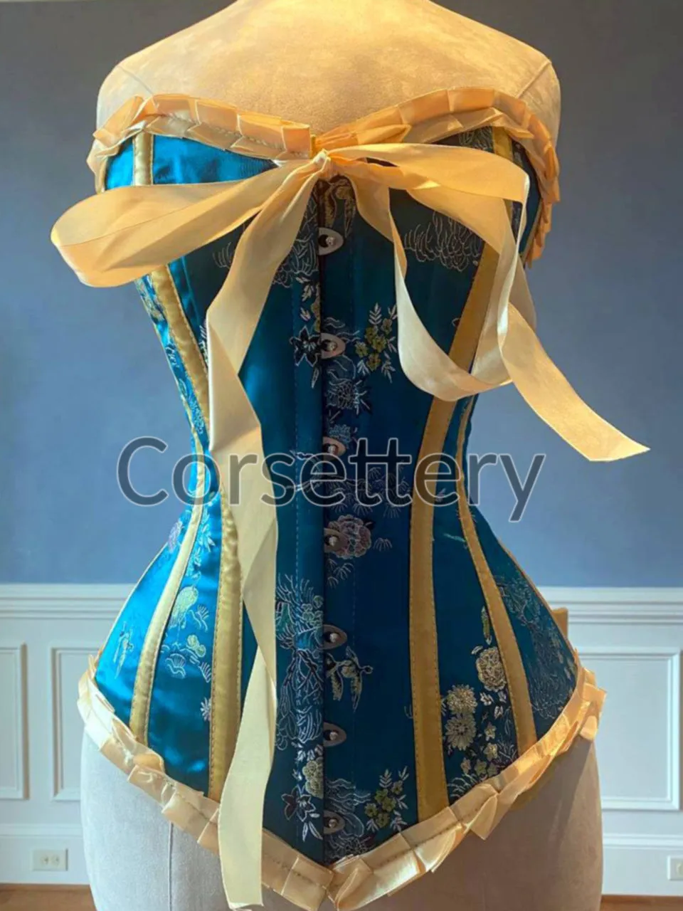 Bright blue brocade steampunk corset with ribbons and bow. Steel-boned corset for tightlacing. Prom, gothic, steampunk Victorian corset.