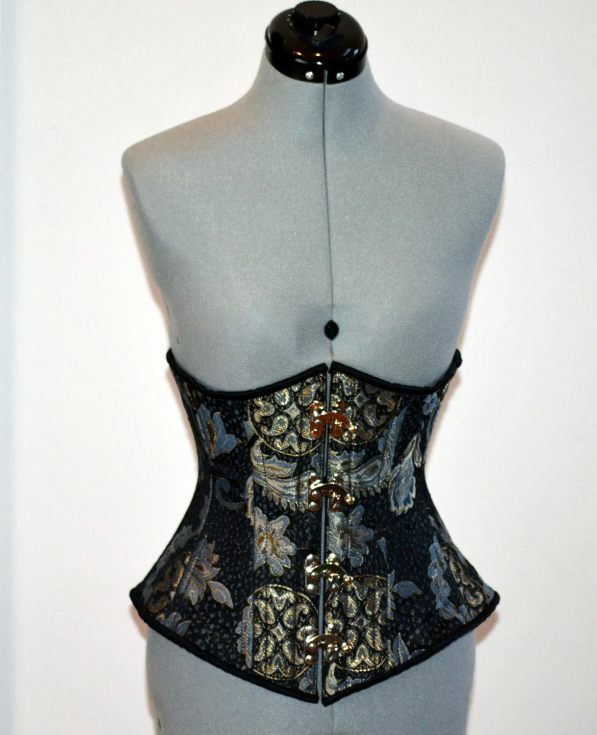 Steel boned underbust steampunk corset from brocade with golden pattern with steampunk hooks. Real waist training corset for tight lacing.