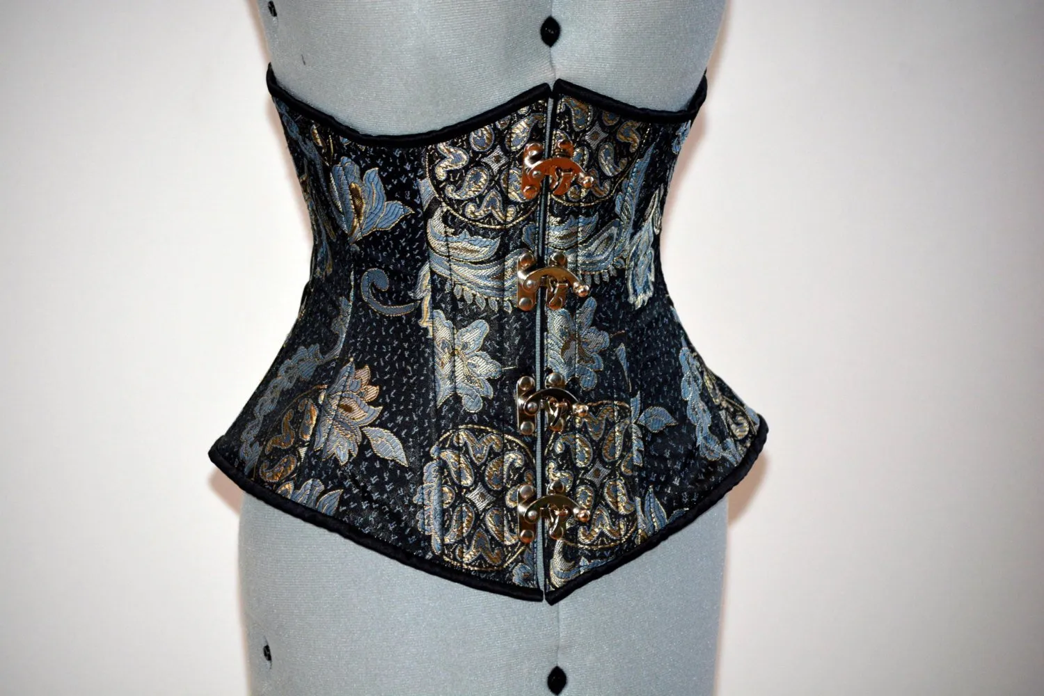 Steel boned underbust steampunk corset from brocade with golden pattern with steampunk hooks. Real waist training corset for tight lacing.